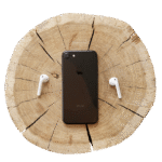 iphone mobile phone, smartphone, touch screen, make a phone call, communication, technology, mobile, cellular, headphones, tree trunk, wood, isolated, cut out